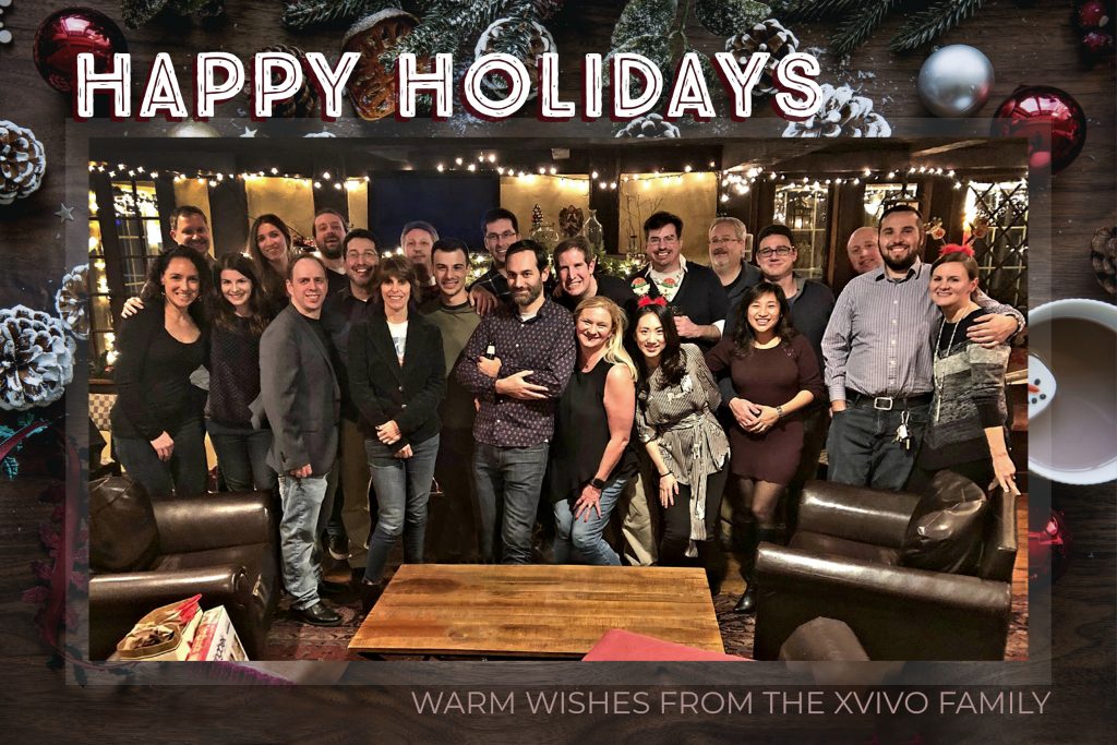 Brown holiday card showing the XVIVO team