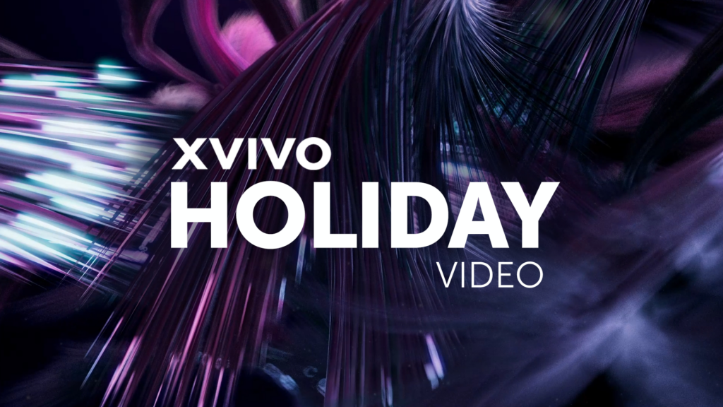 A dynamic and abstract digital design showcasing an array of bright, colorful light streaks, reminiscent of holiday lights. The words XVIVO HOLIDAY VIDEO are prominently displayed in bold white text over the vivid background, capturing the magic inside and out.